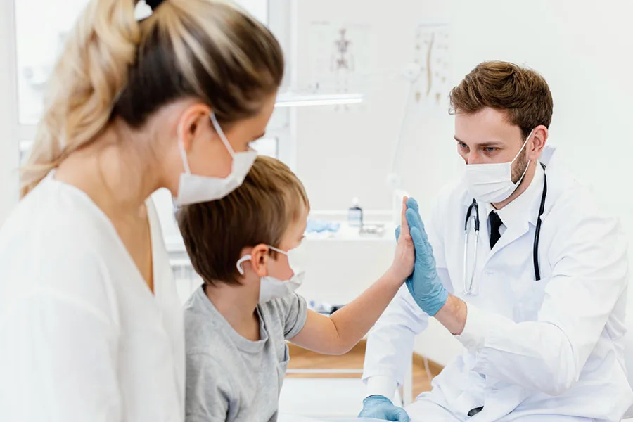 Primary Care close-up-patient-and-doctor-high-five-tampa